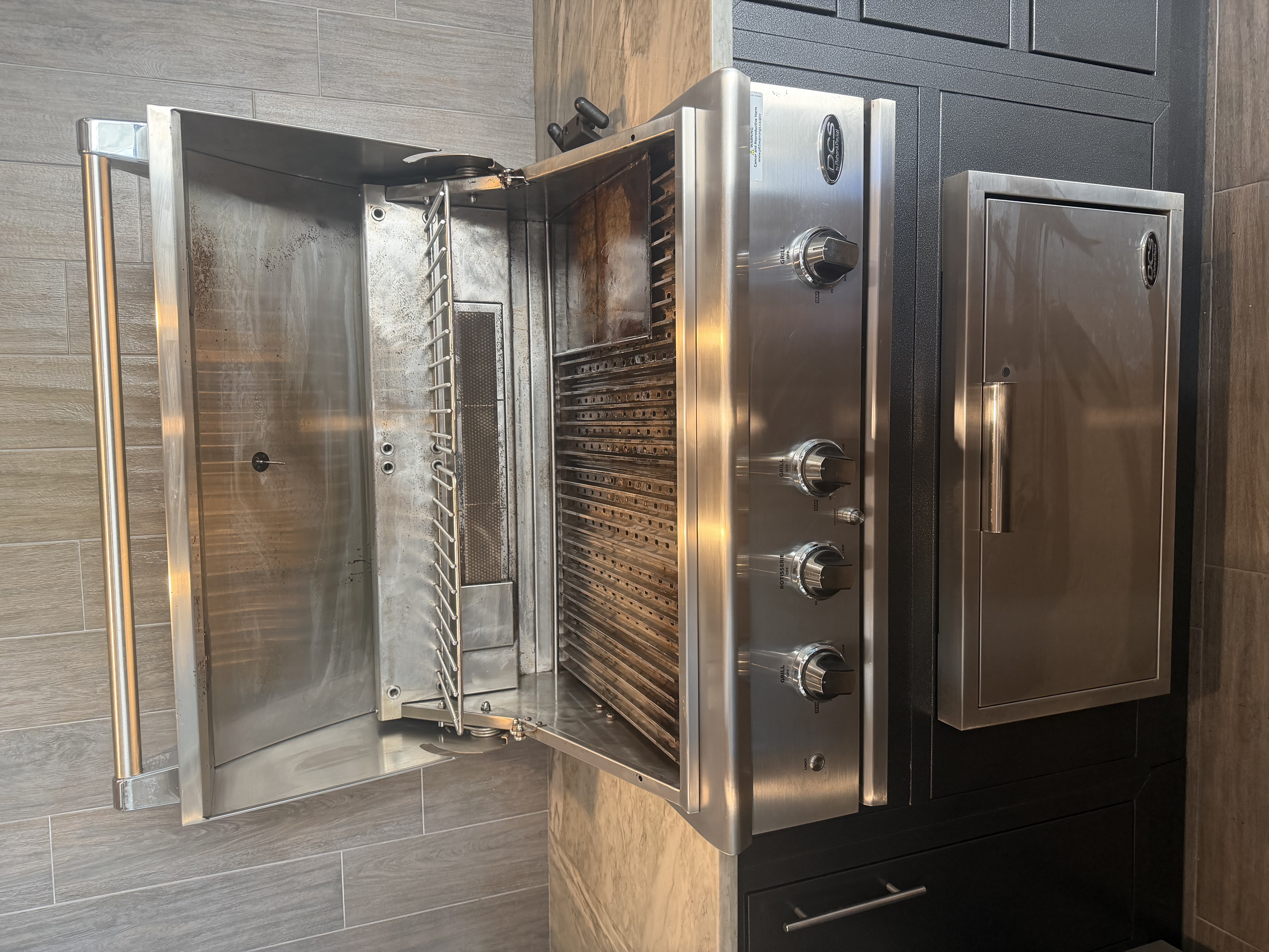After: DCS 4-burner built-in with a polished stainless cookbox and clean control panel